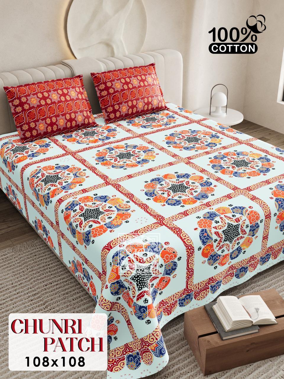 Chunri Patch floral king size bedsheet set with colorful traditional flower patterns in orange, blue and red patches - 100% cotton bedding set 108x108 inches with matching pillow covers displayed on modern bedroom setting
