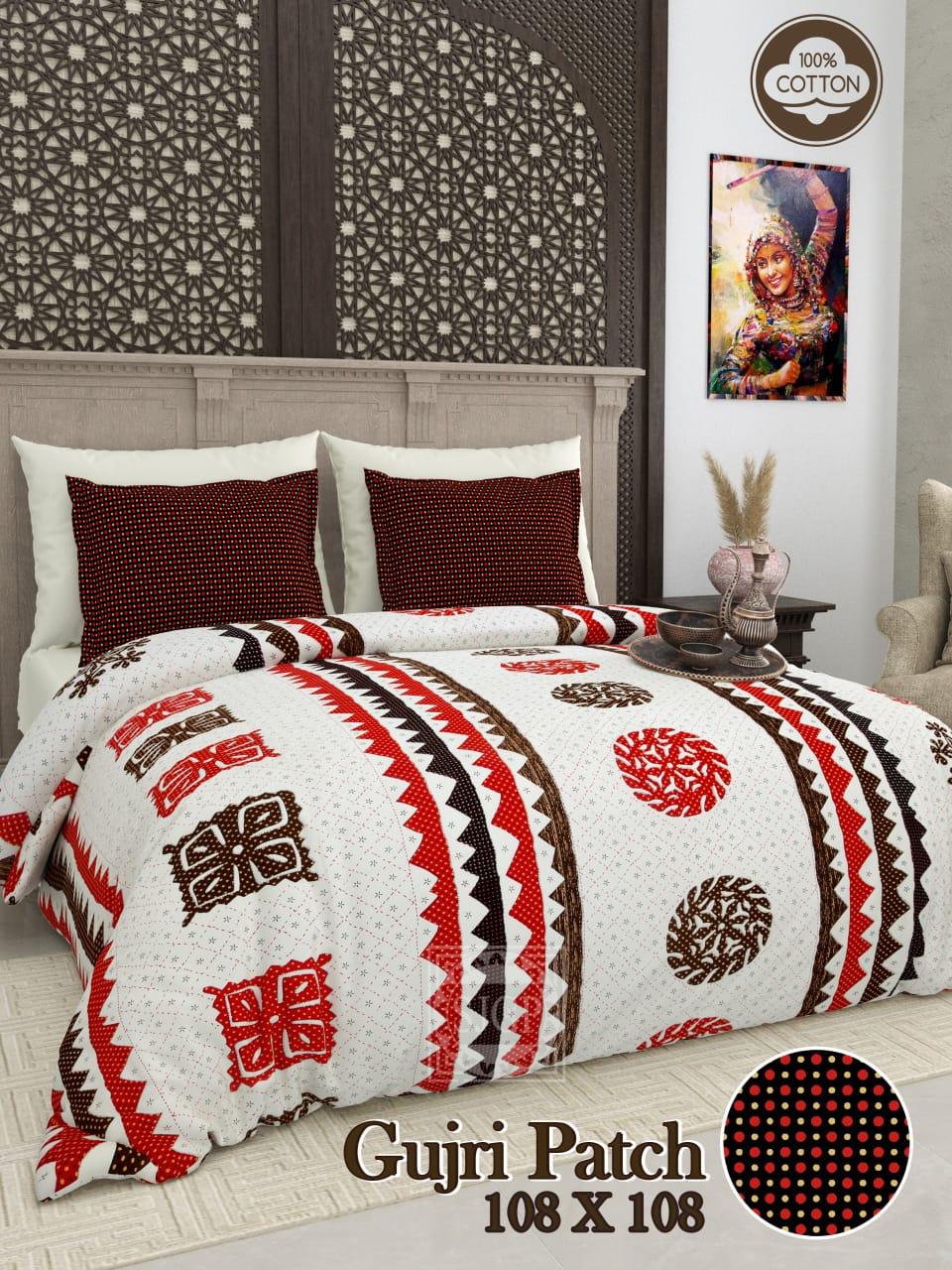 Gujri Patch King Size Pure Cotton Bedsheet Set with traditional red and brown geometric patterns, coordinated pillow covers, displayed on elegant bedroom setting towelleo.com