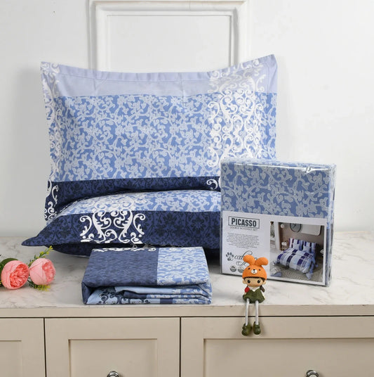 Blue damask bedsheet set with white baroque pattern in two-tone design - Picasso collection 3PC cotton bedding set by Towelleo.com displayed on white dresser with decorative flowers and packaging
