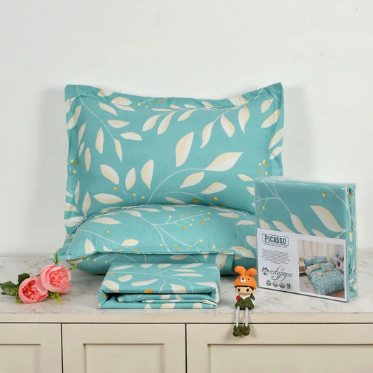 Pink floral bedsheet set with white polka dots and rose pattern - Picasso collection 3PC cotton bedding set with pillow covers by Towelleo.com displayed on white dresser with decorative flowers and packaging
