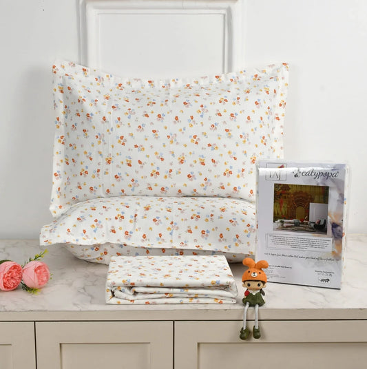 TAJ Collection double bedsheet set with delicate floral print in white background, 100% imported glace cotton fabric, luxury button box packaging displayed with pillow covers towelleo.com