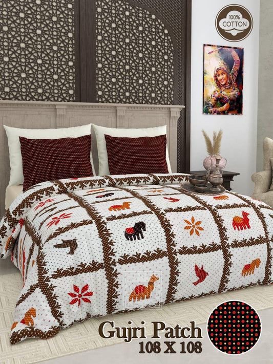 Gujri Patch King Size Pure Cotton Bedsheet Set with traditional animal motifs and floral patterns in brown, orange and red, coordinated pillow covers displayed in elegant bedroom
towelleo.com