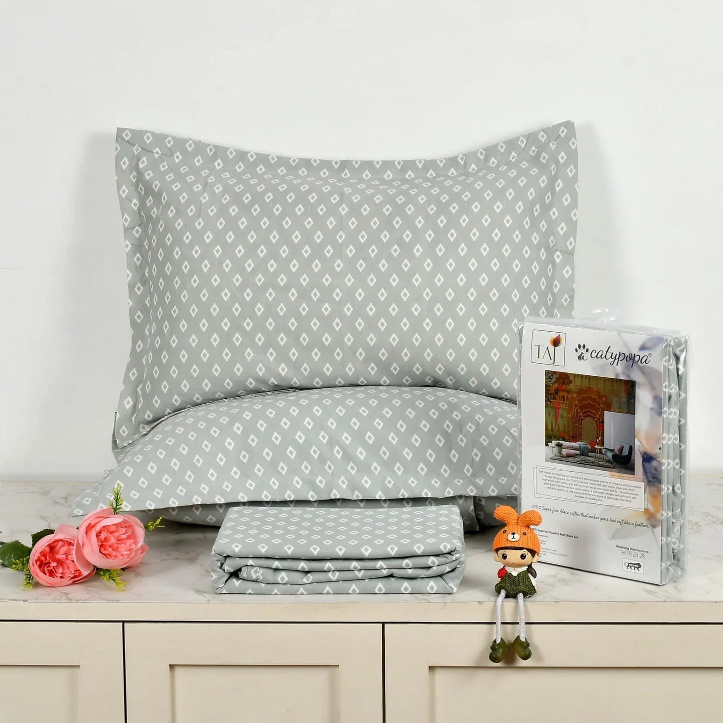 TAJ Collection double bedsheet set with blue box pattern on white background, 100% imported glace cotton fabric, luxury button box packaging with matching pillow covers towelleo.com