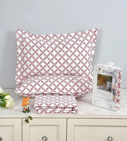 TAJ Collection double bedsheet set with burgundy geometric circle pattern on white background, 100% imported glace cotton fabric, luxury button box packaging with matching pillow covers
towelleo.com