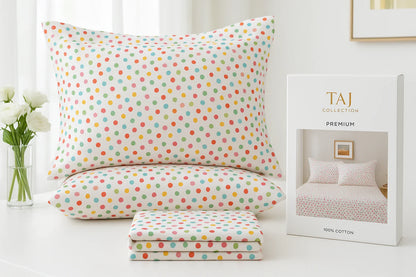 TAJ Collection colorful polka dot bedsheet lifestyle shot with packaging
